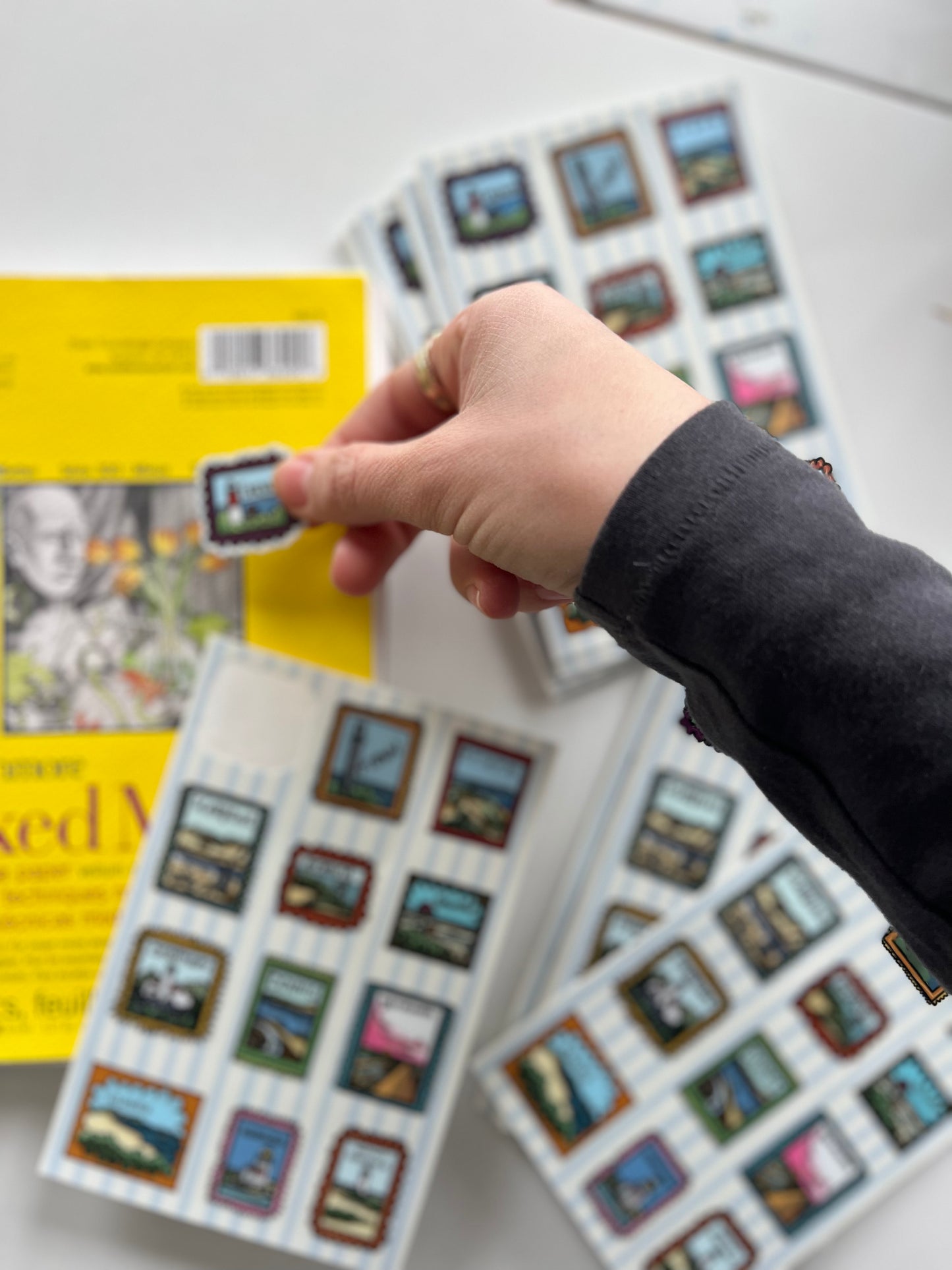 Cape Cod town-themed sticker sheet with hand-drawn stamp-style illustrations of Nauset Light, Wellfleet oysters, and Nantucket