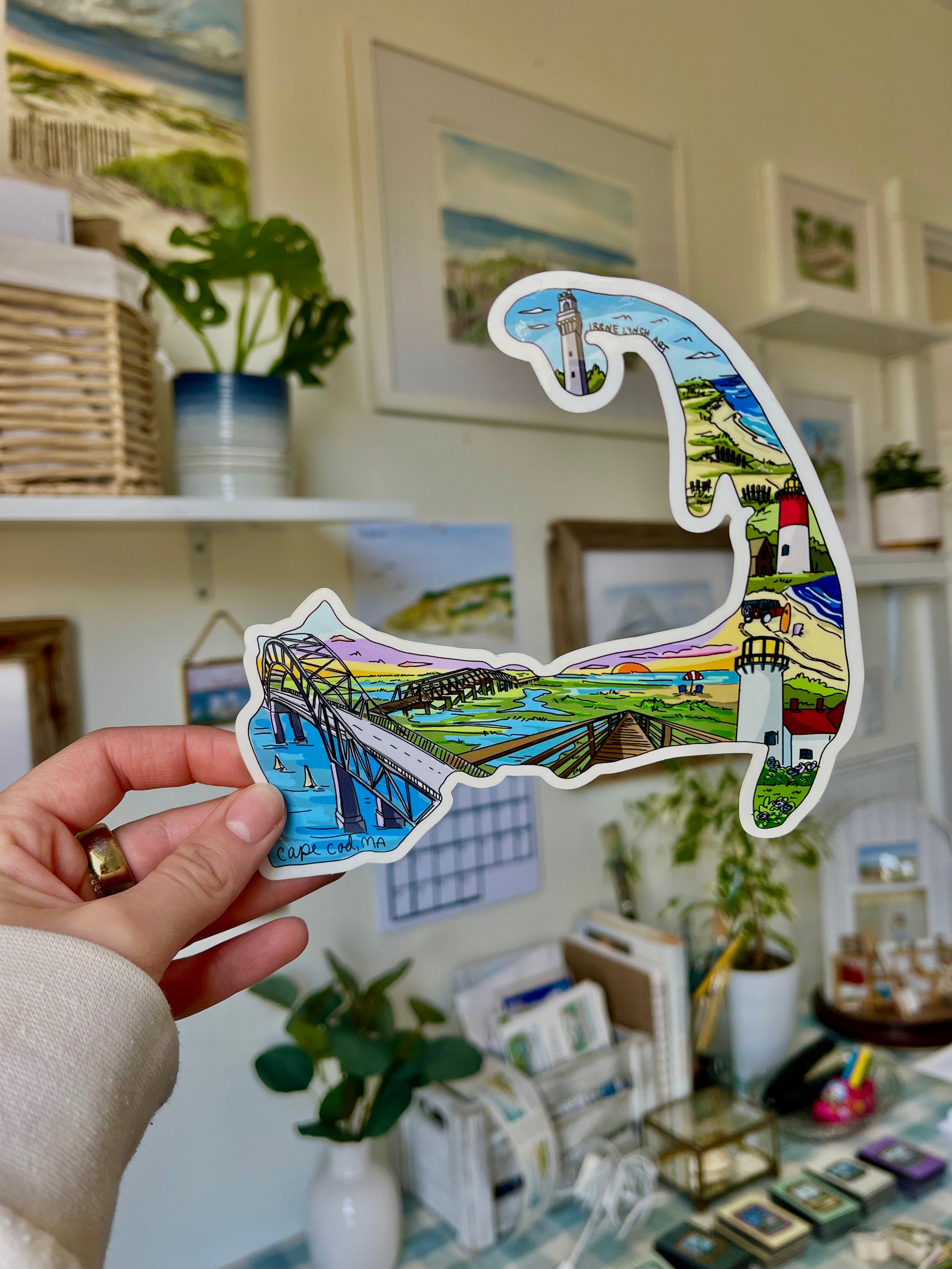 Cape Cod Map Sticker featuring Provincetown's Pilgrim Monument, Nauset Light, Chatham Lighthouse, Sandwich Boardwalk – illustrated waterproof vinyl sticker by Irene Lynch